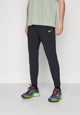STRIDE PANT - Pantalon de survêtement - black/reflective silver
